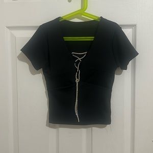 Never worn gift from italy. Fits a small, the cleavage area is about a size B.